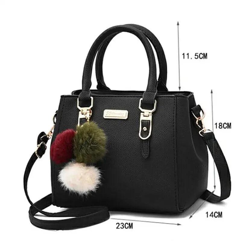 Bolsa Vintage Boston em couro PU e pêndulo pelúcia